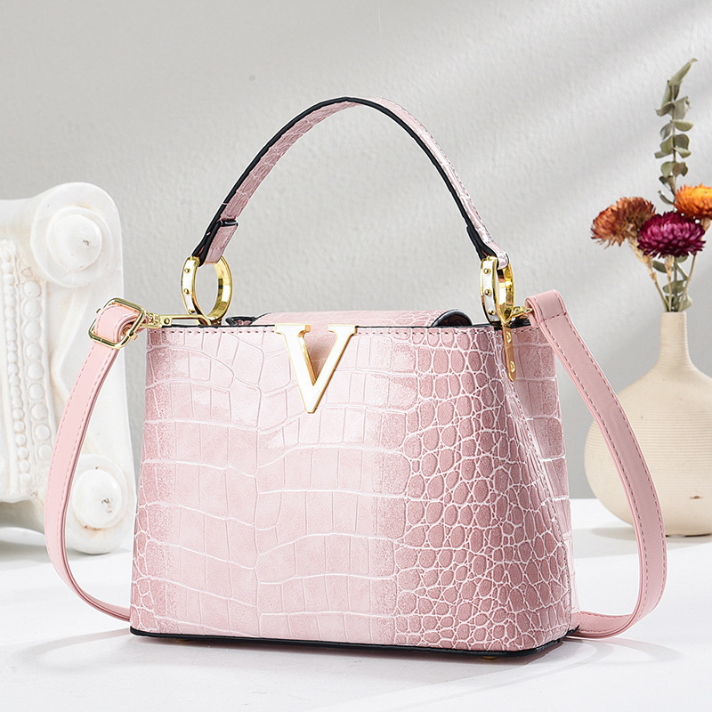 Patrón de cocodrilo de charol 2025 nuevo bolso de moda bolso de cubo de mediana edad bolso de mensajero de hombro para mujer madre degradada
