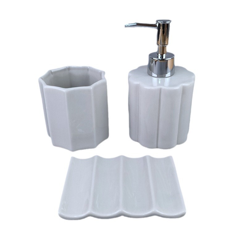 Taza de enjuague bucal de mármol Juego de baño Botella de prensa de cerámica Juego para el hogar Juego de tres piezas de almacenamiento de baño de hotel