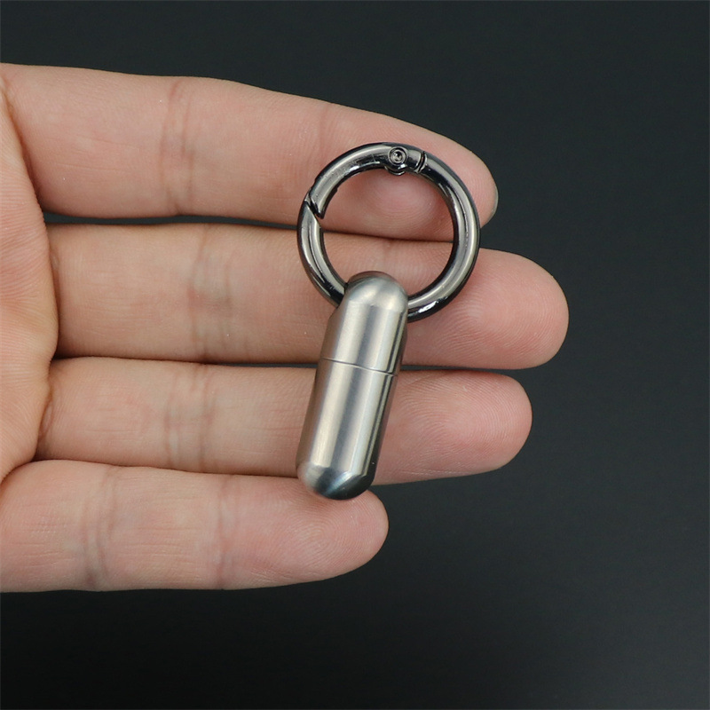 Puro titanio cápsula portátil pequeña caja de la medicina a prueba de humedad sellado de acero inoxidable impermeable almacén pastillero transfronterizo mini botella de la medicina