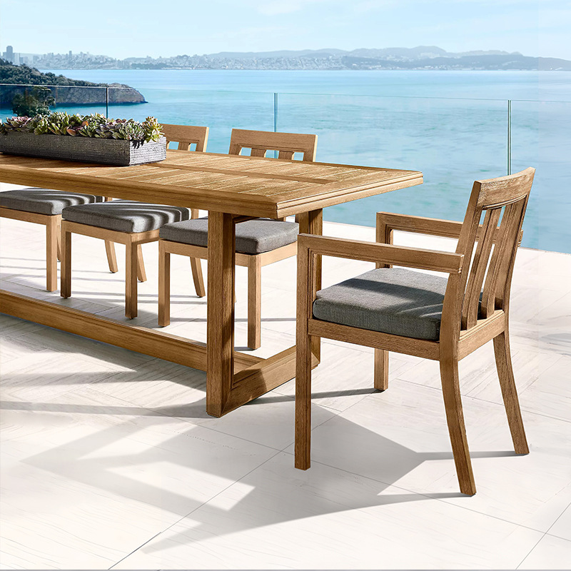 Conjunto de mesa y sillas de teca para patio de villa, madera maciza con acabado envejecido, madera anticorrosiva, mesa y sillas de exterior resistentes al agua y al sol.