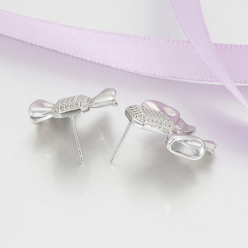 Xuping micro gemas artificiales aleación de cobre chapado arco blanco pernos de arco simple elegante temperamento auriculares al por mayor mujeres