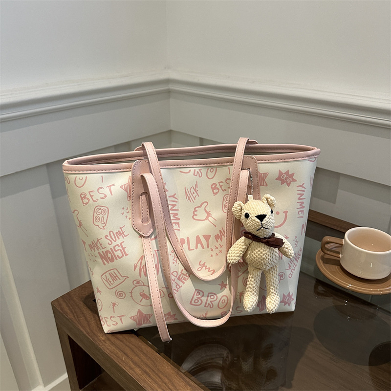 Cute casual oso estampado de gran capacidad 2024 nuevo estilo simple viajero de un solo hombro bolso portátil para estudiante bolso femenino