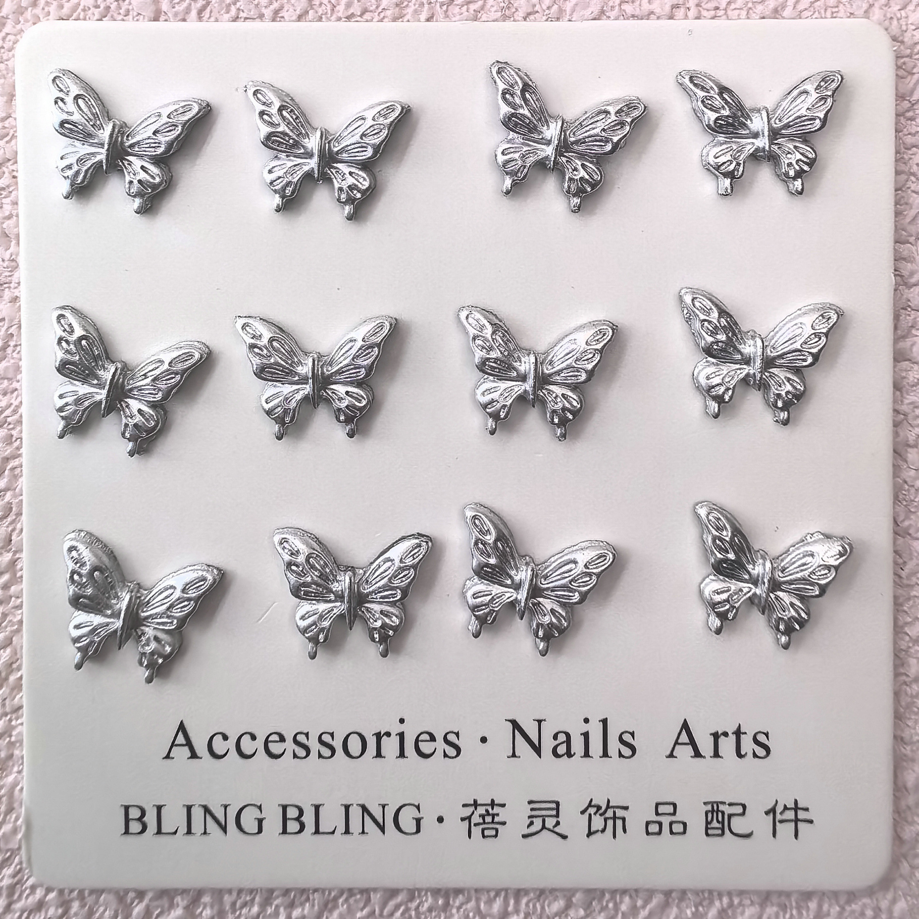 大量现货银色蝴蝶美甲饰品轻奢立体蝴蝶结金属大蝴蝶翅膀指甲钻饰