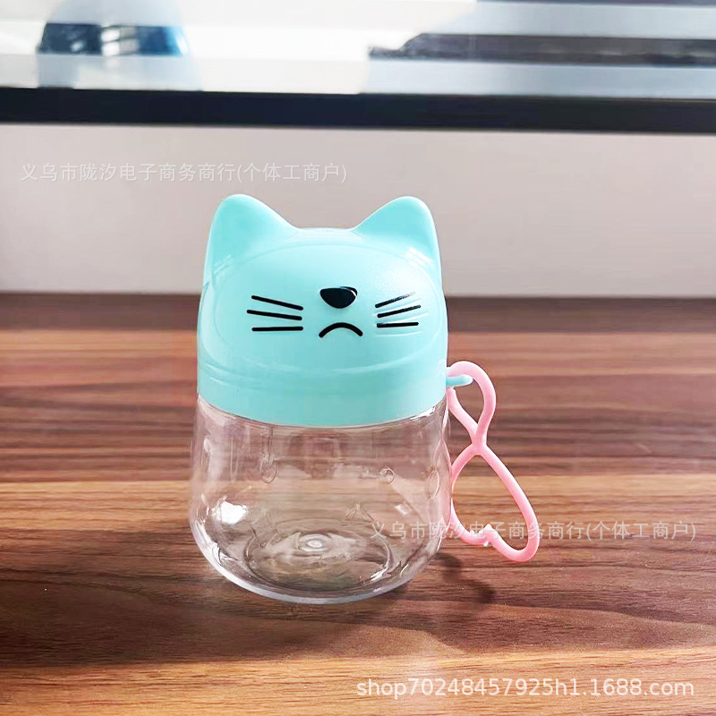 Gato de dibujos animados lindo botella de embalaje de plástico transparente de alimentos para mascotas de grado portátil caramelo con tapa soluble de frijol de color arcilla tarro lote