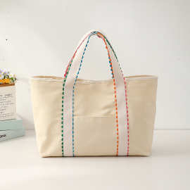 南风包包大容量帆布托特包手提化妆包2025春都市简约竖款方型