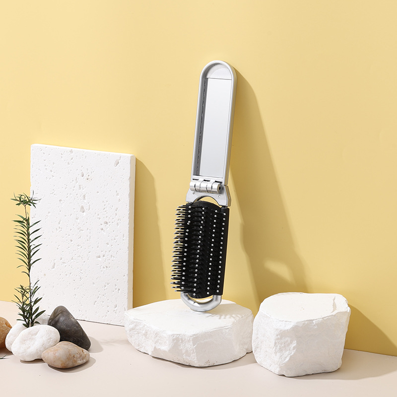 Shunfa plegable espejo peine de plástico de viaje portátil plegable airbag peine portátil espejo cosmético de doble uso integrado espejo peine