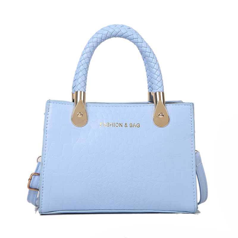 Bolsa de moda con textura para mujer 2024 estilo coreano estilo occidental nuevo color caramelo patrón de piedra bolso tejido bolsa de mensajero
