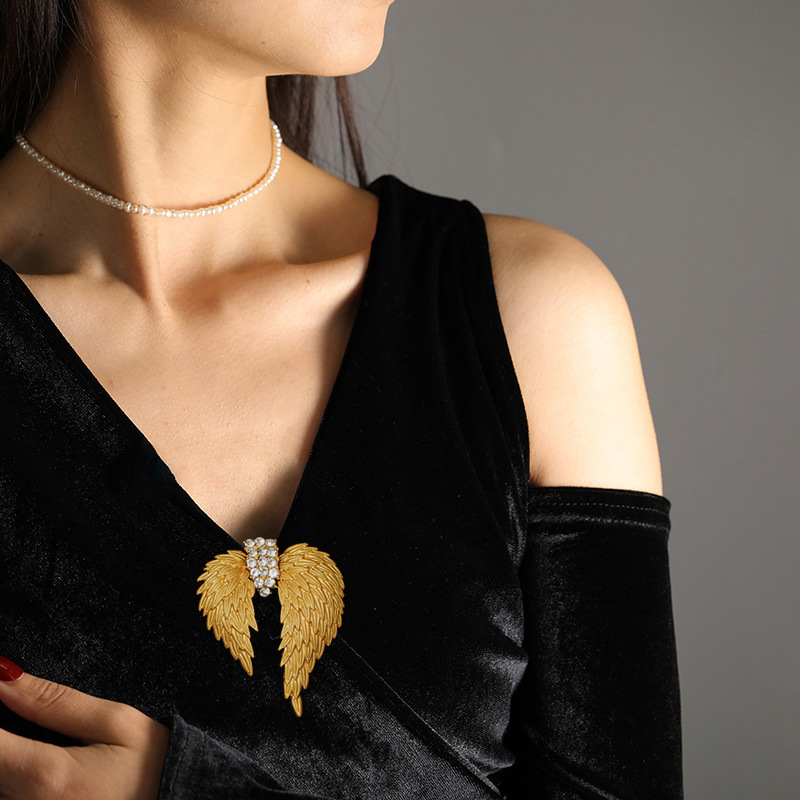 Spilla a forma di ala di piuma, spilla medievale placcata in oro spesso_voghion.com