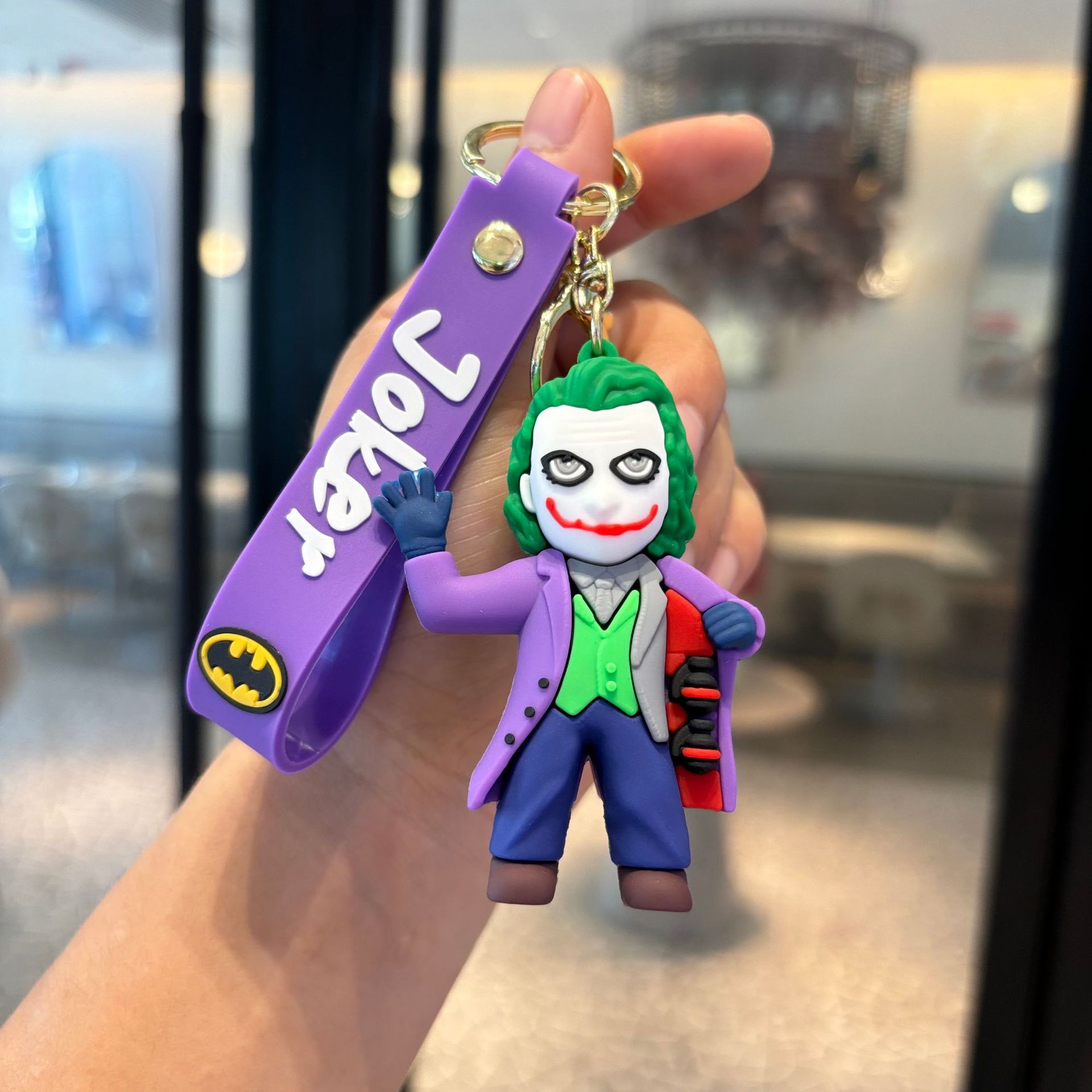 Batman cruzado superhéroes clown muñeca coche llavero colgante muñeca máquina de regalo pequeño