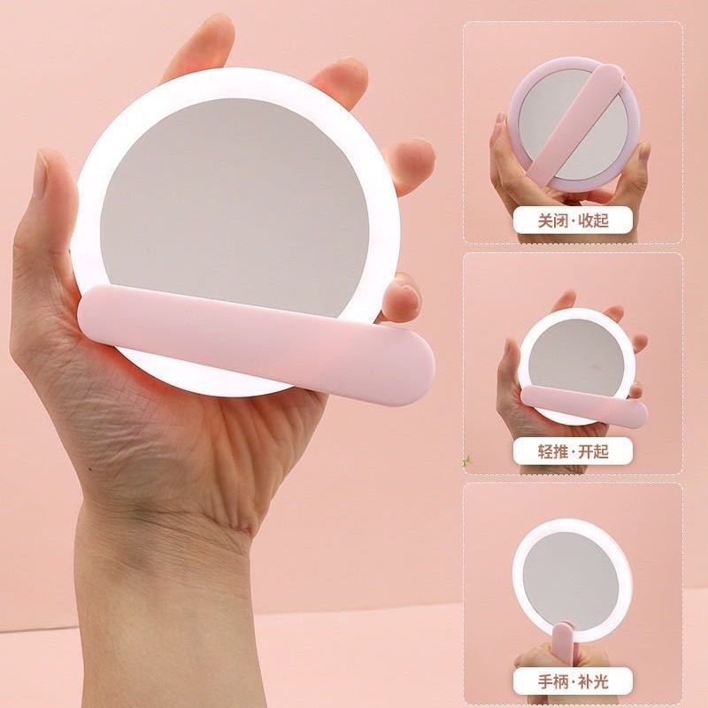 Fabricantes de absorción transfronteriza espejo de mano led espejo de maquillaje con lámpara portátil espejo de mango pequeño espejo plegable