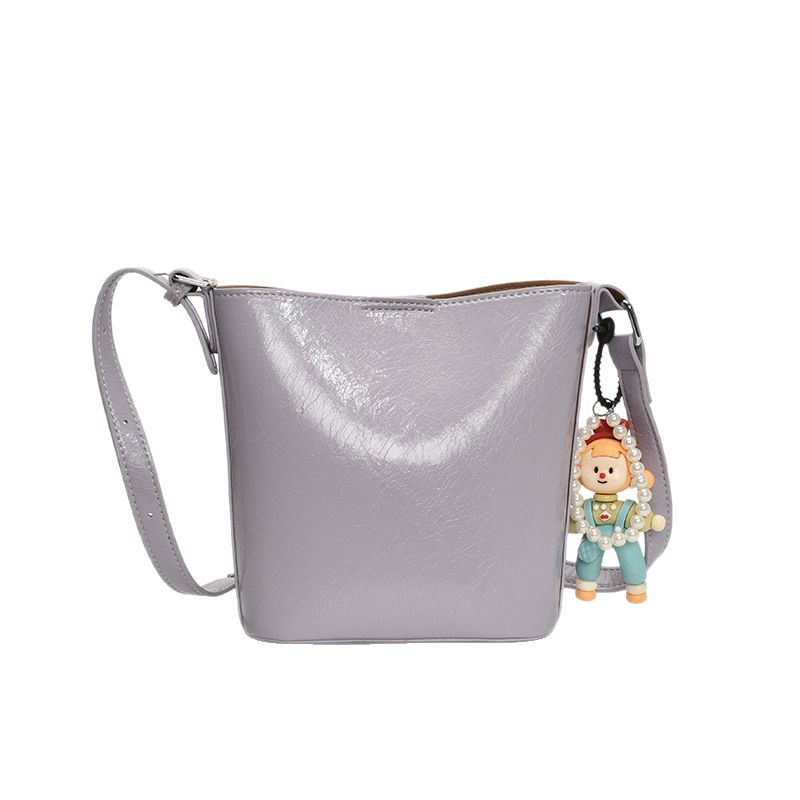 Bolso de cubo de tendencia simple y de alto nivel para mujer 2025 nuevo bolso de hombro casual de moda bolso de mensajero de cercanías