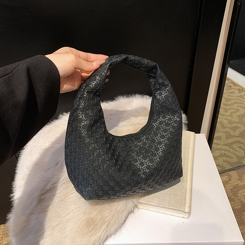 Bolsa de viaje de moda simple dulce2024 invierno nueva personalidad temperamento casual de gran capacidad bolso de media luna portátil