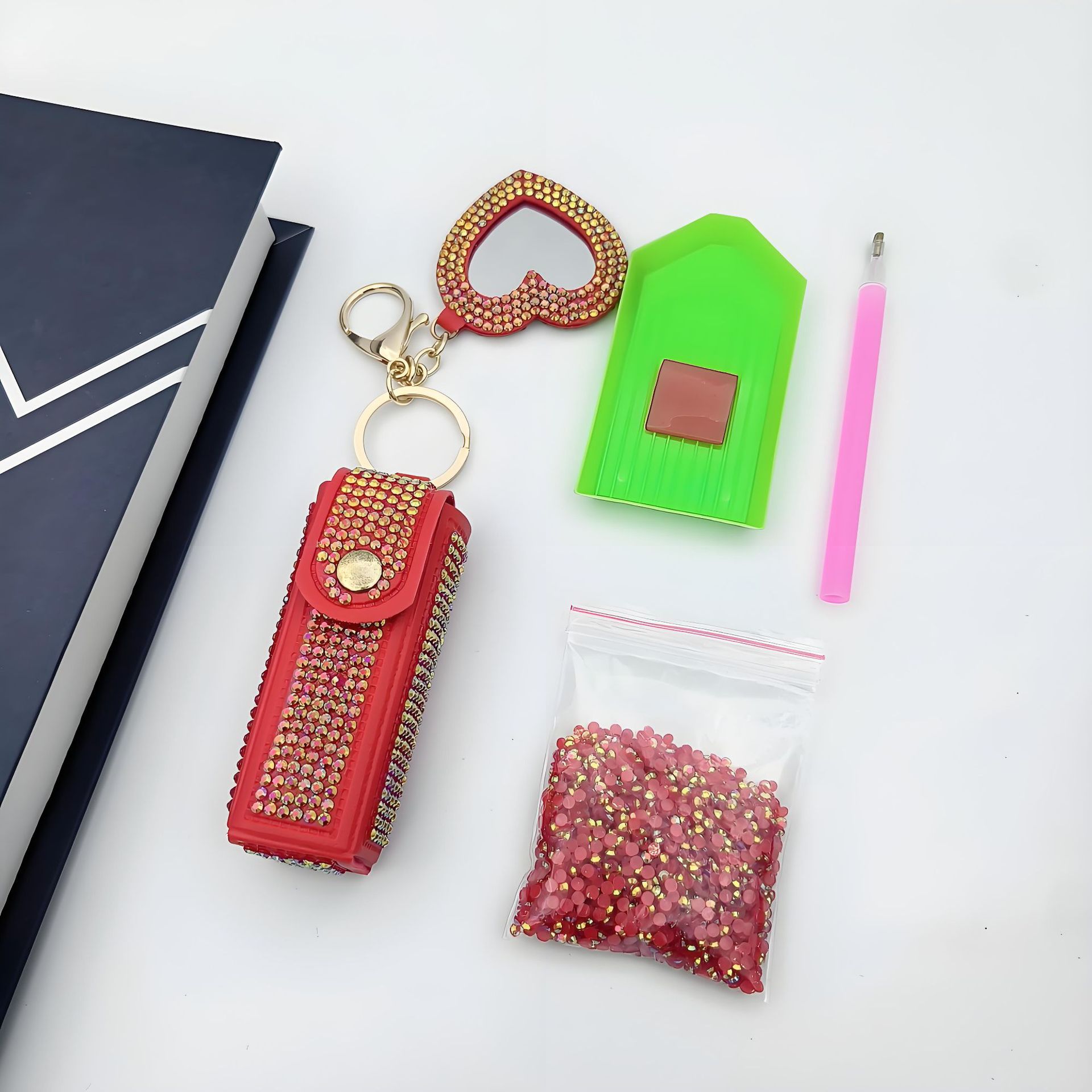 Bolso de cambio transfronterizo sobre rojo espejo creativo llavero colgante pequeño PU cuero bolso de coche accesorios accesorios en stock