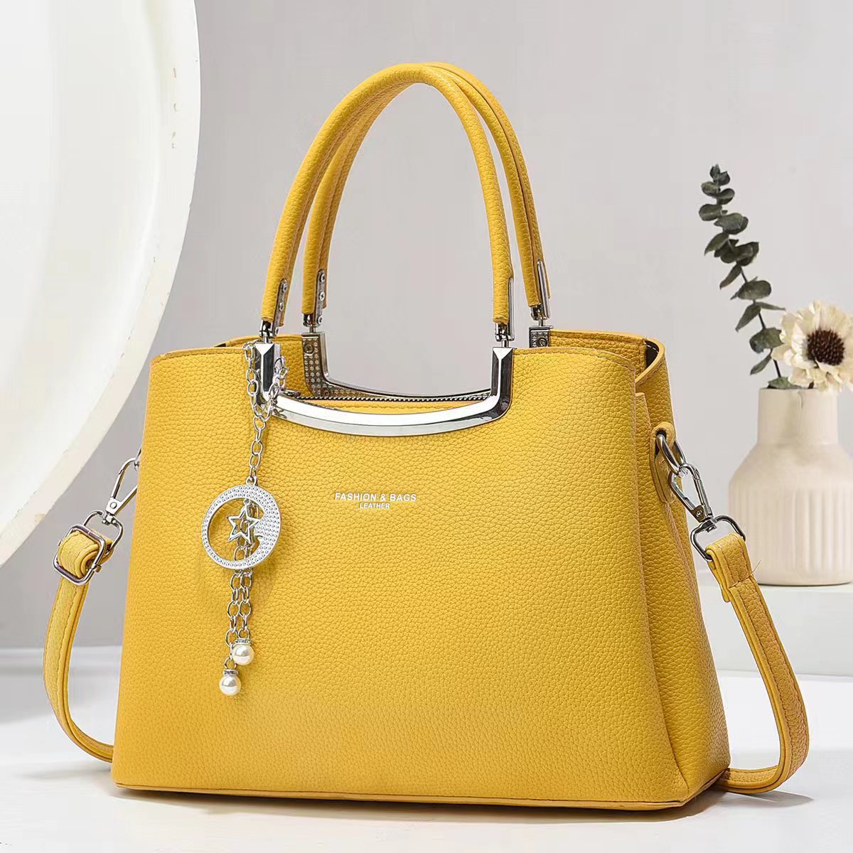 Bolso de hombro universal fabricante de alta calidad sensación de gran capacidad bolso de moda de madres de mediana edad bolso atmósfera