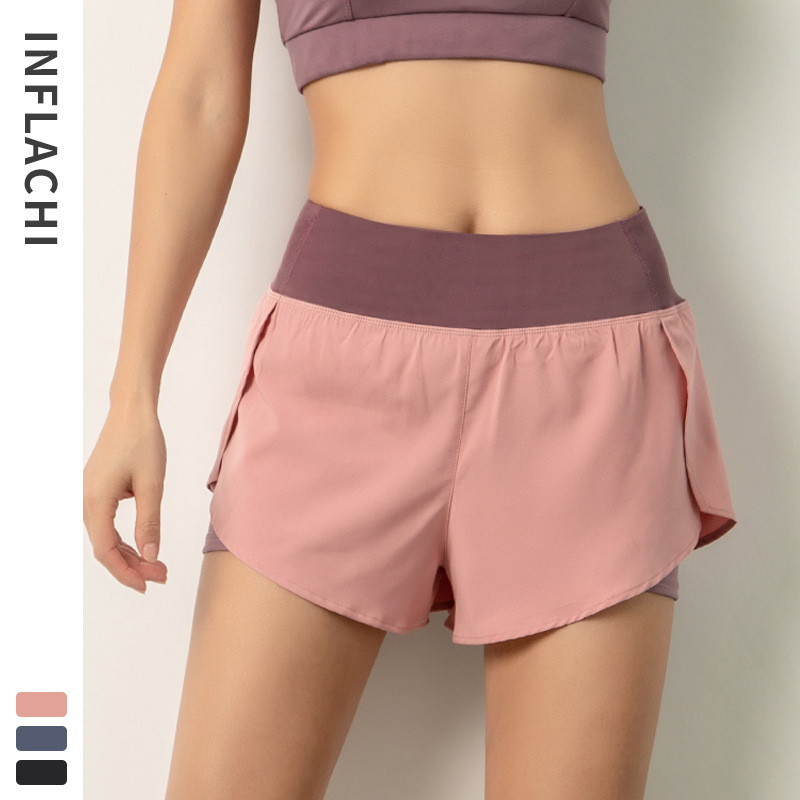 Pantalones cortos de yoga sueltos y anti-iluminación de alta gama pantalones cortos de secado rápido transpirables para mujer entrenamiento de carrera pantalones cortos de fitness de cintura alta verano