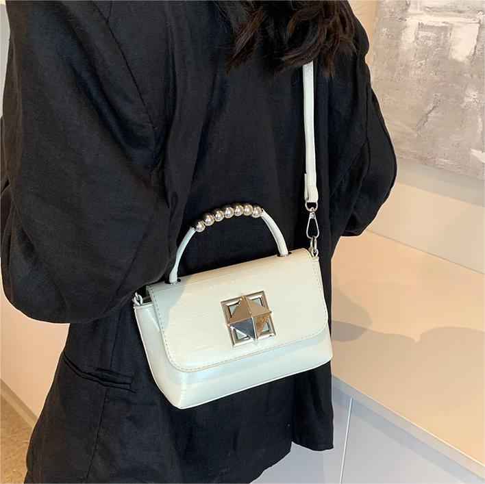 Bolso de mano caliente de verano 2024, nuevo bolso de mujer, bolso pequeño de moda coreano, bolso de mochila casual universal.