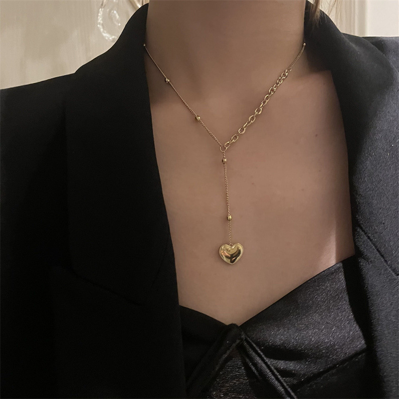 Titanium Steel Plated 18k Gold High Color Retention European And American Ins French Retro Three-dimensional Love Pendant English Letter Collarbone Necklace display picture 2