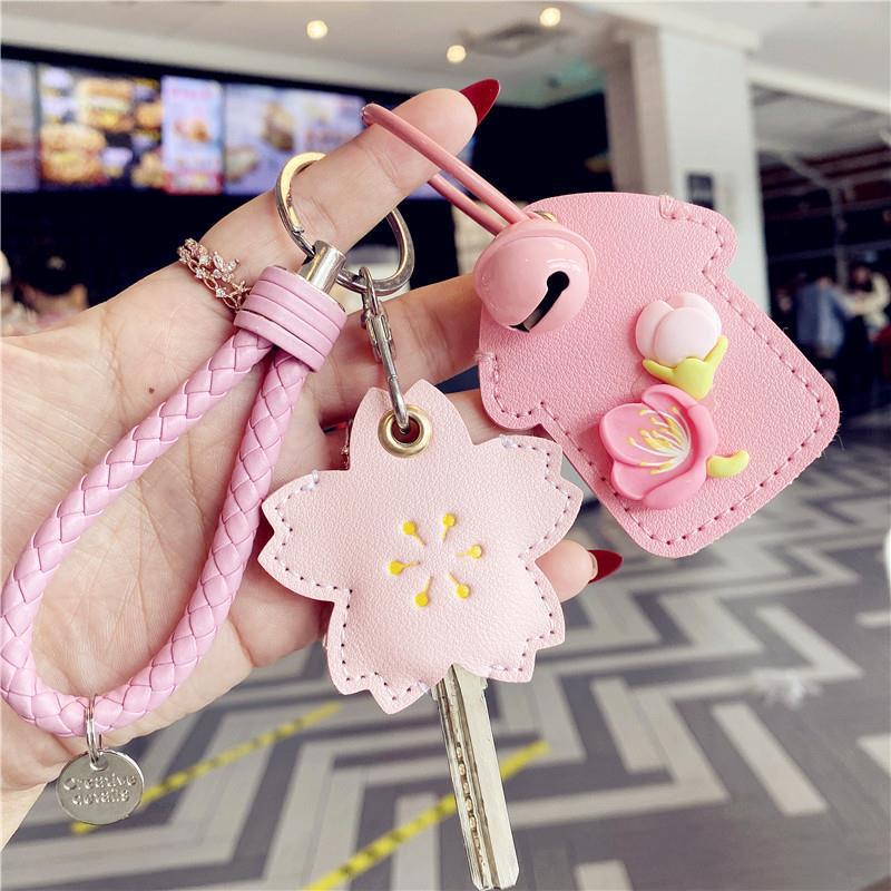 Cubierta de la llave nuevo corazón de niña explosiva Llavero Coche eléctrico PU Cubierta de la tarjeta de control de acceso para el hogar Sensor de gota de agua Amazon