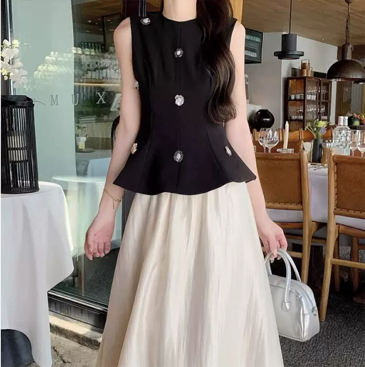 时尚套装女2025春夏季新款无袖黑色背心修身气质收腰半身裙两件套