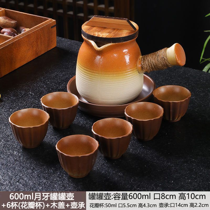 Tetera en una estufa, tarros de té con leche a la parrilla, ollas especiales, utensilios de cerámica de cocción en seco para el hogar, juego completo de juegos de té