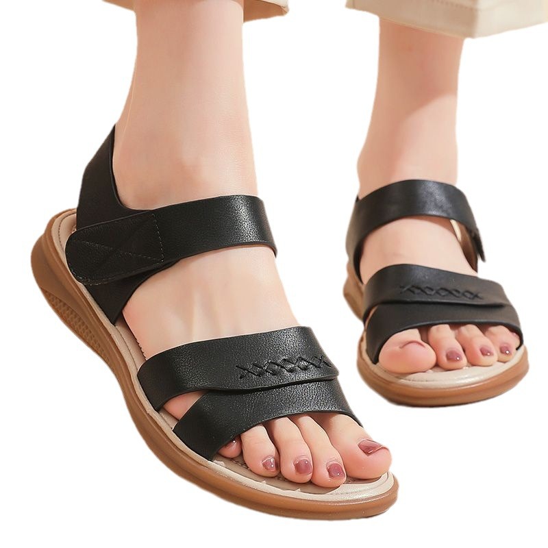 Sandalias planas para mujeres 2024 verano nuevo estilo de moda versátil suave confortable sandalias de madre con falda