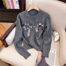 露思同款灰色宽松慵懒风针织衫开衫女秋蝴蝶结毛衣外套