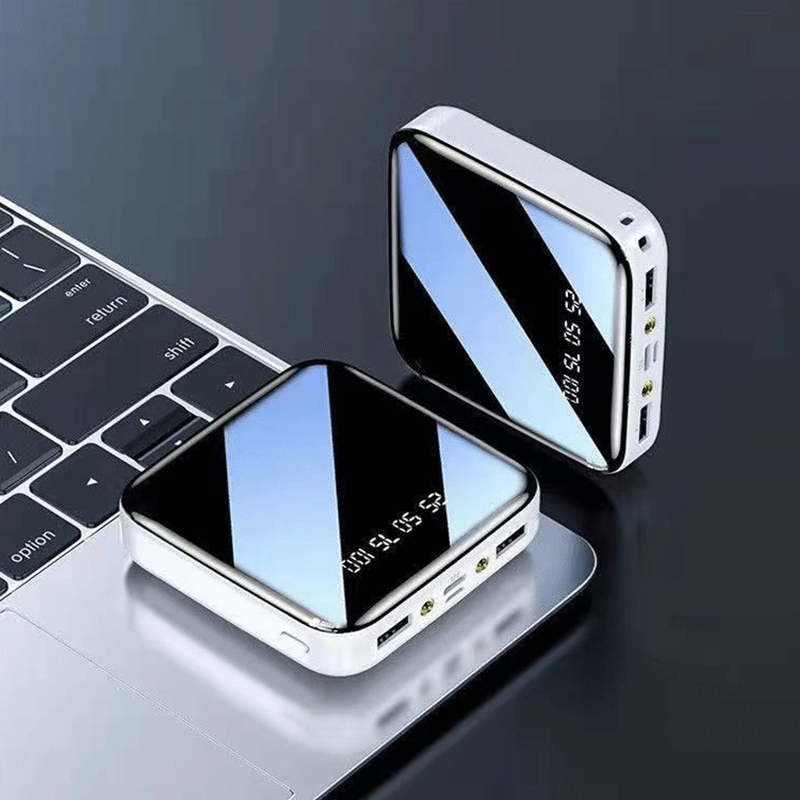 Lámpara LED de visualización digital espejo de doble puerto 20000 mAh compartido teléfono celular cargador al aire libre fuente de alimentación portátil en stock