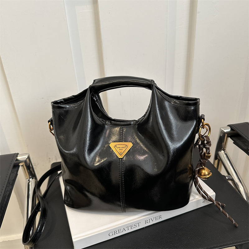 2024 alto valor retrógrado estilo de negocios Meillard bolso de cubo de mano de viaje versátil de invierno nuevo bolso de hombro