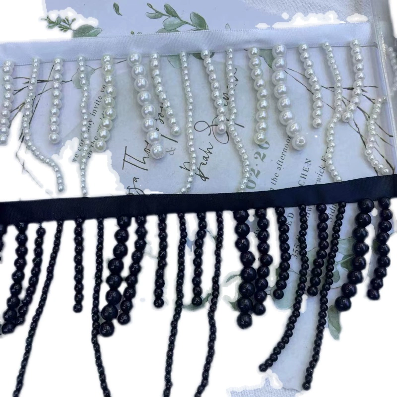 Beads with tassels handmade from pearl, cloth