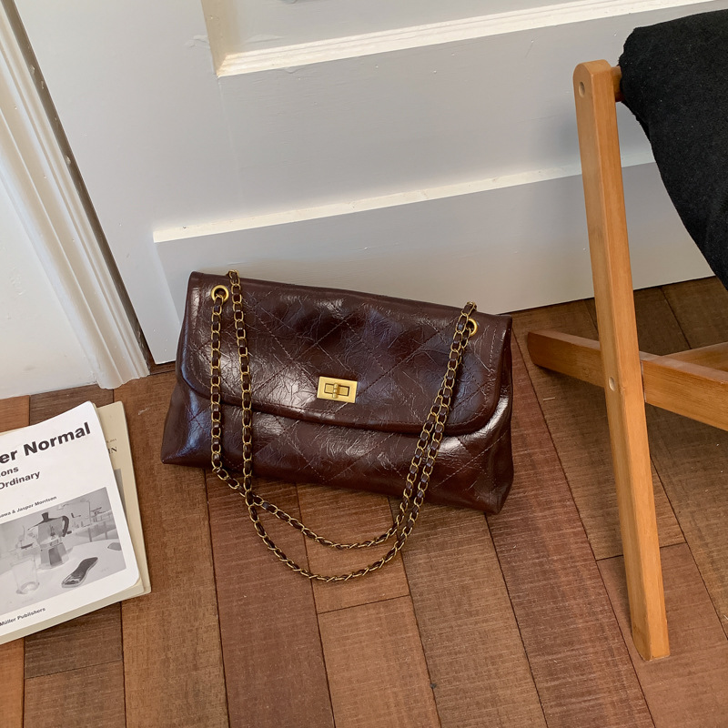 Bolso retro de gran capacidad para mujeres 2026 nueva moda cadena de diamante mochila de hombro de nicho de viaje bolsa de mano