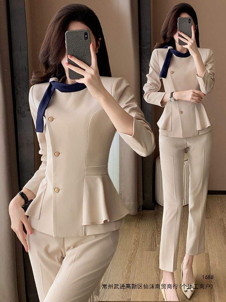 Apricot-colored suit for women, elegant and professional attire for beauticians, teachers, and CEOs.