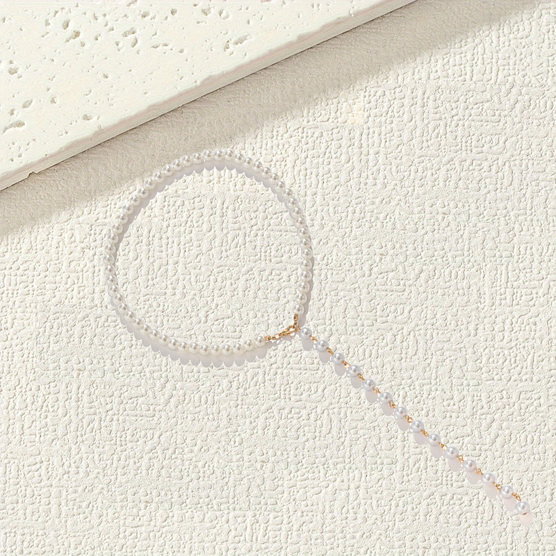 Colar longo elegante vintage com pérolas e borlas_voghion.com