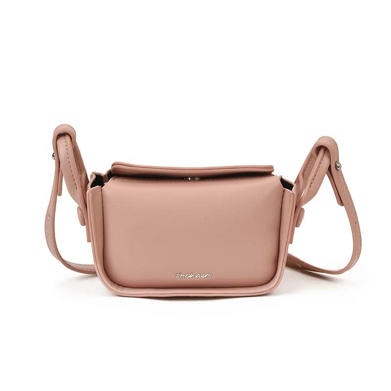 Bolsa de hombro coreana para niños y niñas simple color sólido mini bolso de hombro para niñas letras extranjeras para niños bolso pequeño