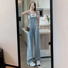 薄い色の高い腰の広い足のデニムの背もたれのズボンの女性の夏の小さい背はゆったりしていて、やせているストレートな筒は地面を引きずって体のズボンの子供を連ねます。