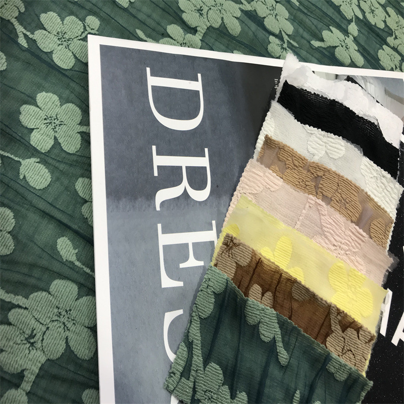 弹力针织蕾丝提花面料 双面夹层柔软 跨境时尚女装连体裙箱包布料