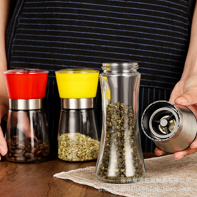 Molinillo manual transfronterizo hogar cocina botella de molienda de acero inoxidable botella de molienda de grano de pimienta negra botella esparcidora ultrafina