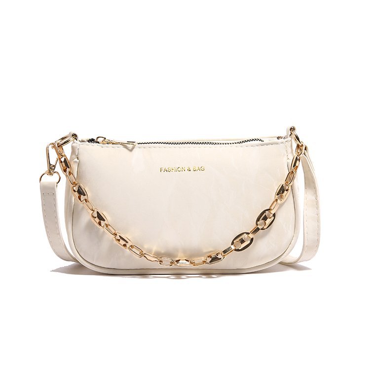 Popular 2024 nuevo viaje de invierno mochila de hombro de textura de moda mochila de nicho de diseño de cadena bolso debajo de la axila