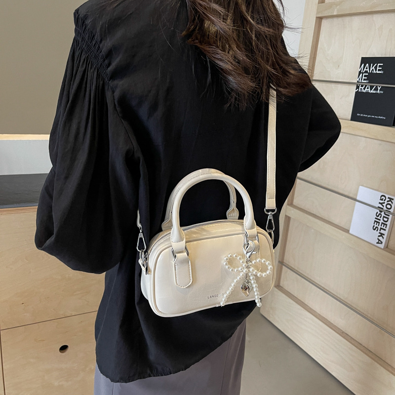 Bolso de mano de alta textura versátil verano 2024 nuevo bolso de mujer estilo extranjero versátil bolso de hombro bolso de viaje