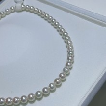 海水akoya珠串黄金点位7-7.5mm正圆几乎无暇冷白带一点粉色伴彩