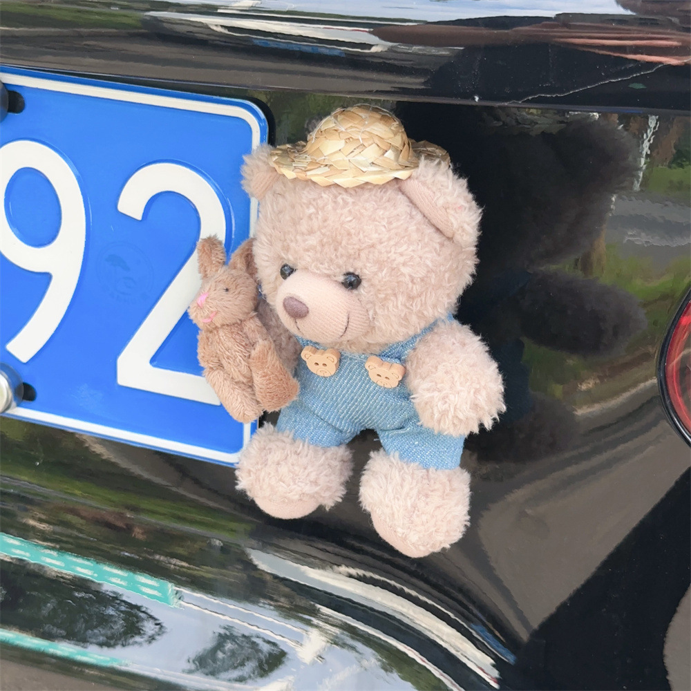 Personalidad encantadora del oso en línea decoración de la cola del automóvil adornos muñecas de peluche fuera del automóvil suministros de automóvil estables