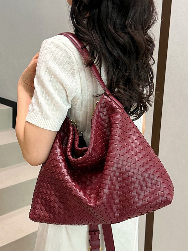 Bolsa para mujeres 2026 comercio exterior nueva textura de alta calidad tejida versátil bolso de mano de gran capacidad de lujo ligero bolso de viaje