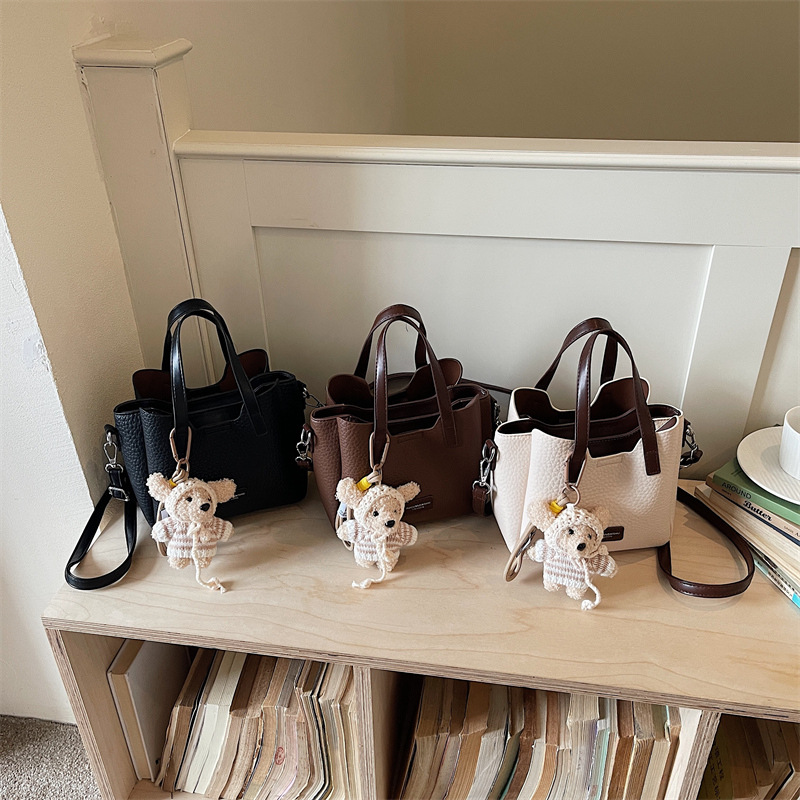 Bolso de cubo popular coreano para mujeres 2026 primavera nuevo nicho Zhong tote bag de alta calidad mochila de viaje
