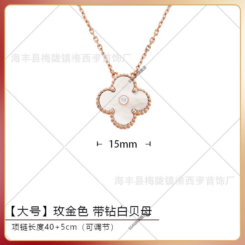 Large four-leaf clover necklace in rose gold with white mother-of-pearl and diamonds in the middle