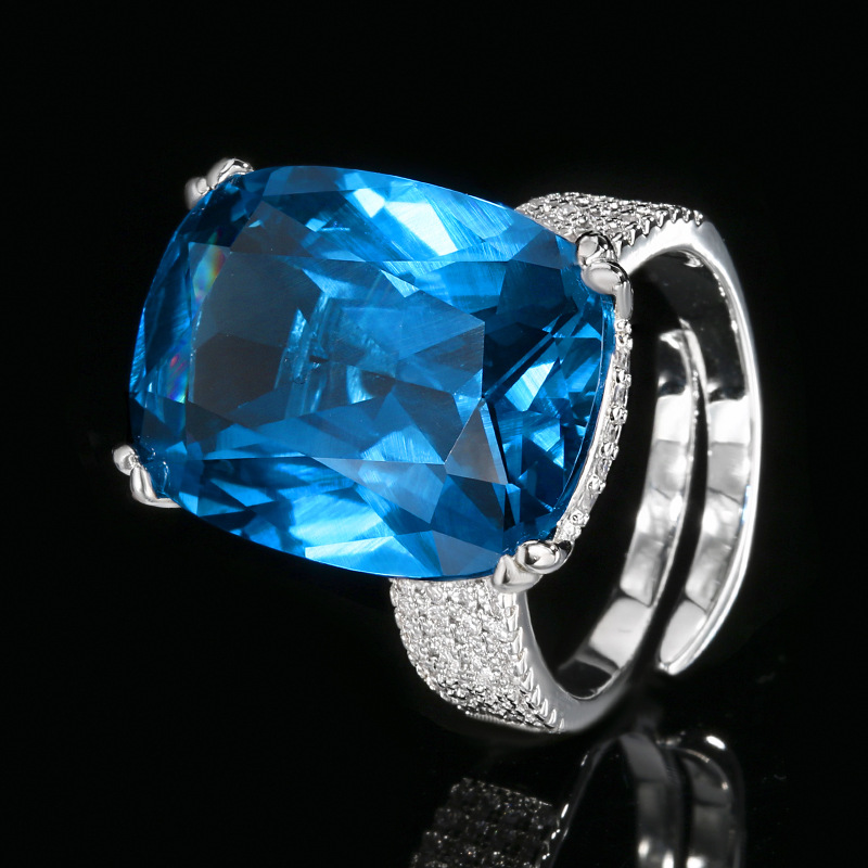 Otoño e invierno nuevo estilo Zhuangshengsheng joyería fondo de cobre chapado en oro simulación de moda blanco chapado en azul anillo femenino piedra 15*20