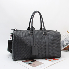 手工编织男手提旅行包高质感行李包商务大容量登机包单肩斜挎包潮