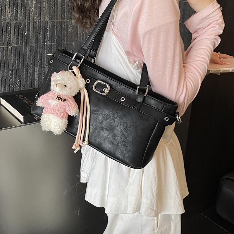Bolsa de viaje simple para mujeres 2026 primavera nueva sensación diaria de hombro brazo bolso de nicho bolso de tramo inclinado ocio