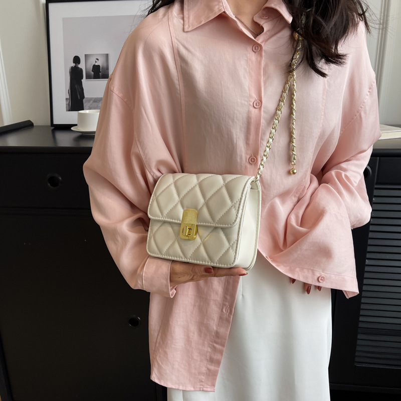 Sentido diario mini bolso para mujeres 2026 primavera y verano nuevo bolso cuadrado de cadena de diamante de moda versátil mochila de hombro