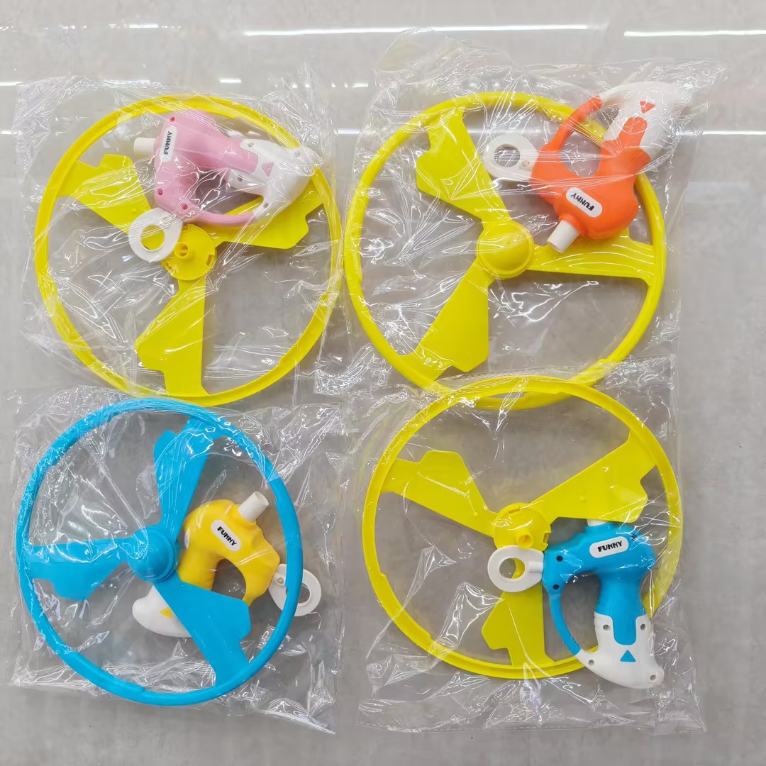 Nuevo platillo volador luminoso y colorido con 12 luces, platillo volador con cordón para tirar, disco volador de seis luces con diseño de hada voladora, juguete infantil para exteriores para puestos de venta ambulantes. image 15