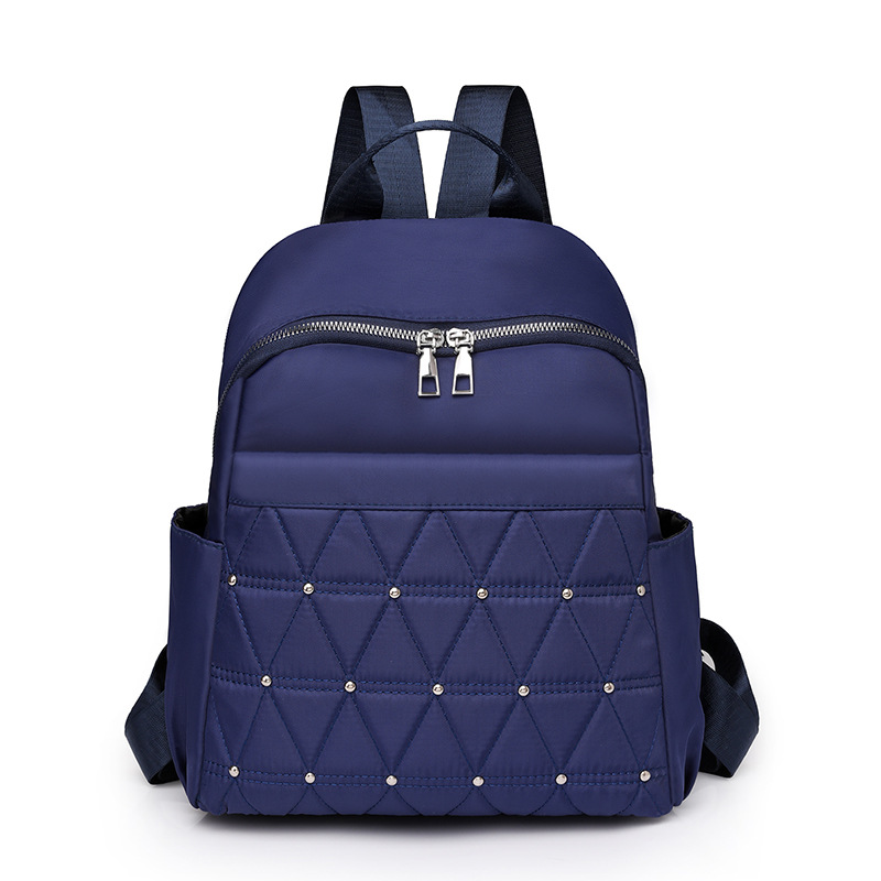Comercio exterior nuevo estilo de gran capacidad casual señoras mochila de nailon moda rombo remache mochila de viaje al aire libre al por mayor