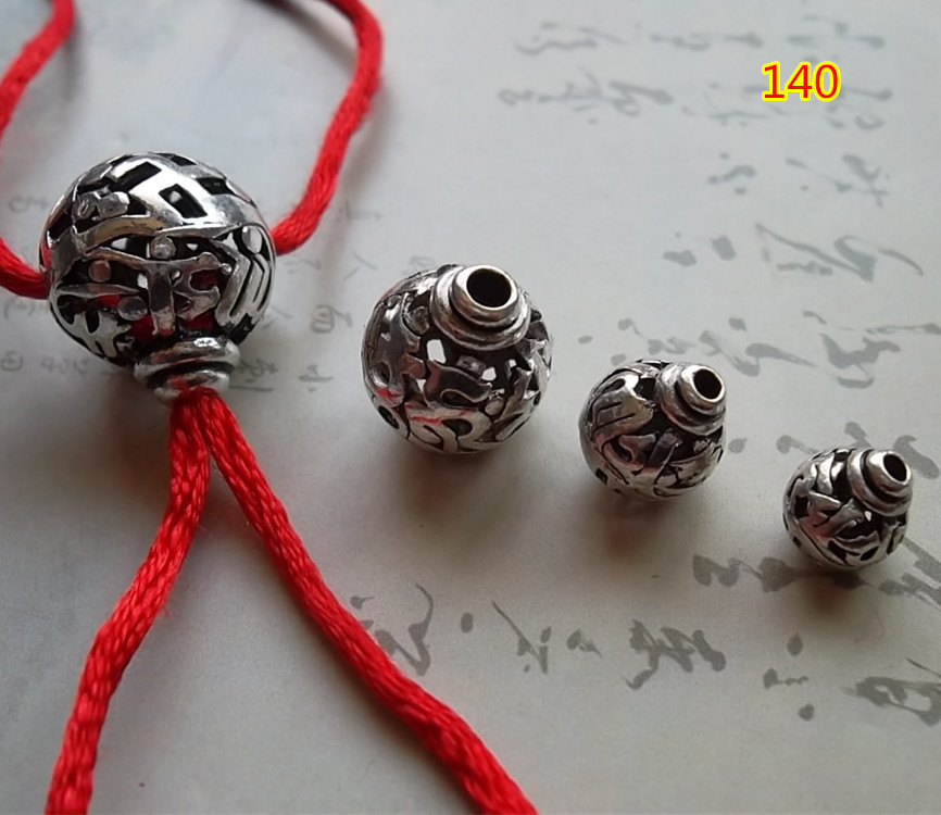 藏银镂空花球佛头三通140
